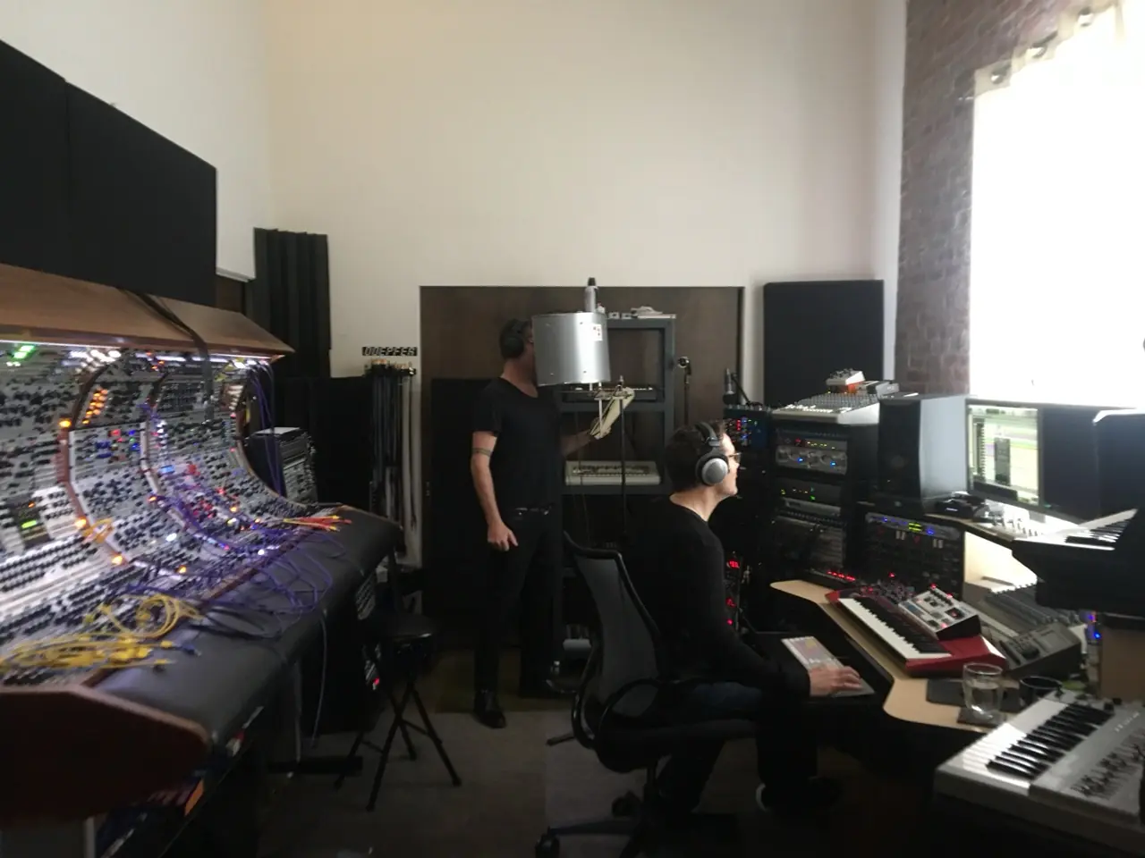 Black Line sessions in the Los Angeles studio: the modular console on the left, two people at the desks